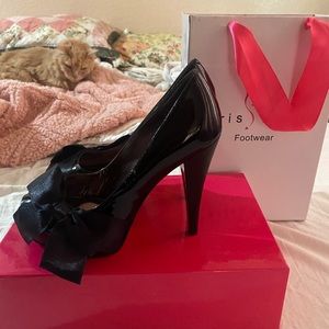 Paris  Hilton Black Patton high heels 👠